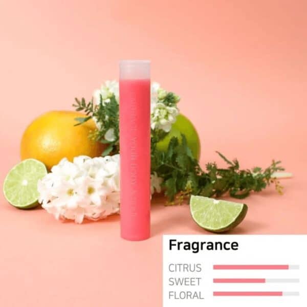 Fresh citrus scent diffuser with floral and sweet notes, ideal for home fragrance, featuring pink diffuser stick, lemon, lime, and white flowers on a pastel pink background.