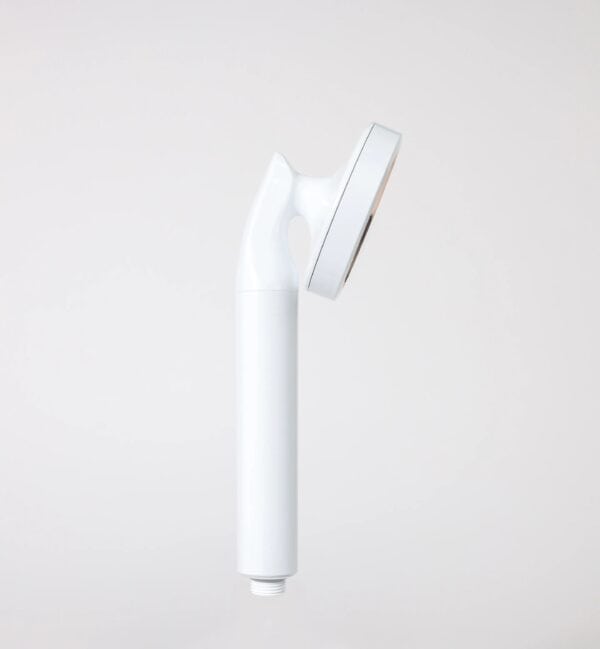 Modern white handheld shower head with adjustable angle for bathroom and outdoor use.