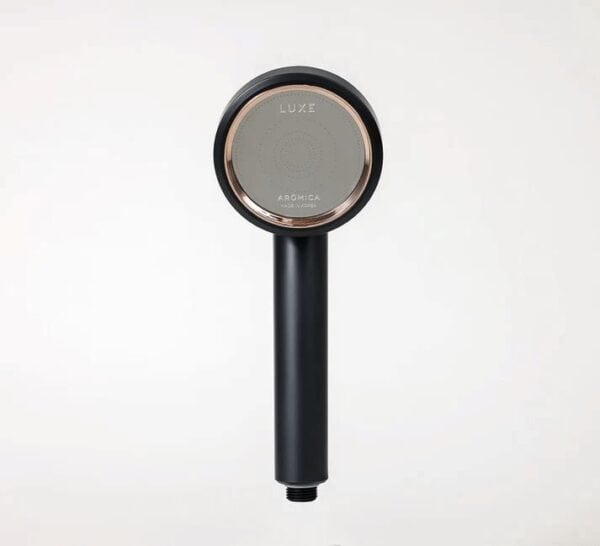 High-quality modern shower head with sleek black finish and gold accents, designed for luxury bathroom spaces, offering a stylish and functional water flow experience.