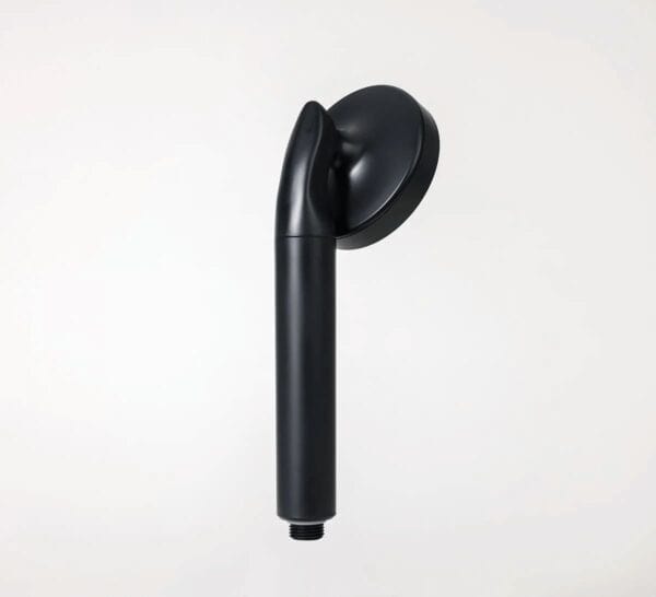 Black shower head with a sleek modern design, handheld style perfect for bathroom spa and water filtration systems.