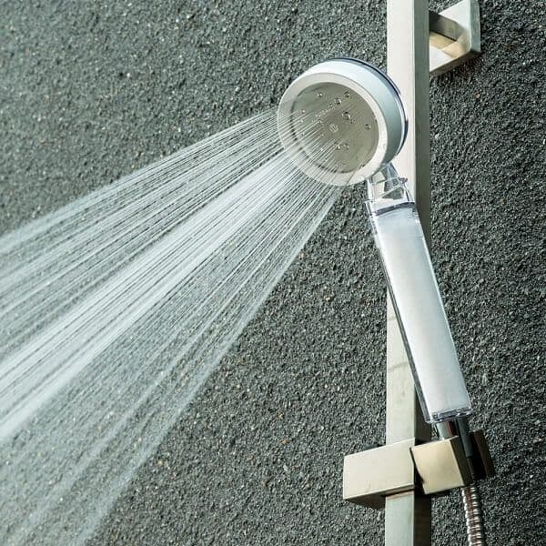 High-quality outdoor shower head with adjustable spray for outdoor bathing and poolside use. Durable stainless steel design for weather resistance and easy installation.