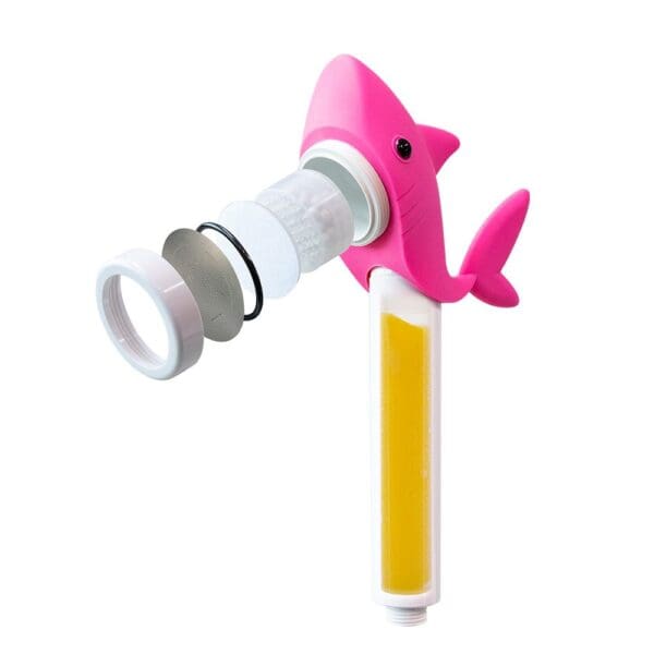 Pink shark-shaped water filter with multiple replaceable filter components and a yellow filter cartridge, designed for effective water purification.
